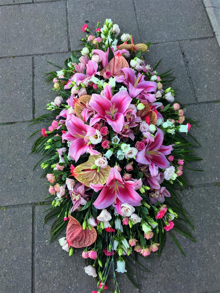 Sympathy funeral flowers Cornwall casket spray Penzance